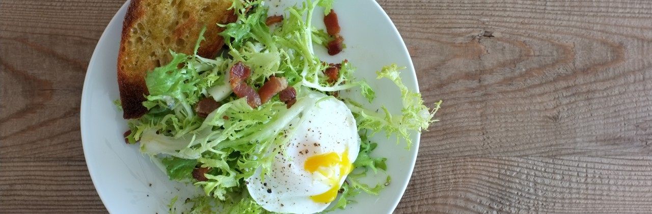 Frisee Salad with Bacon and Poached Eggs